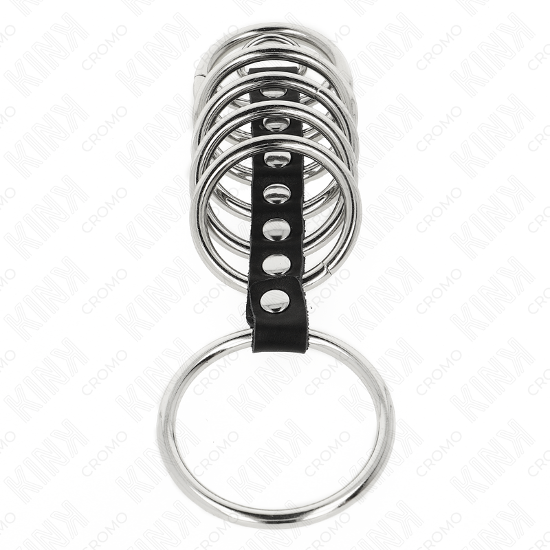KINK - 7 ANNEAUX PÉNIS EN MÉTAL DE 3,2 CM À 5 CM CONNECTÉS PAR DU CUIR